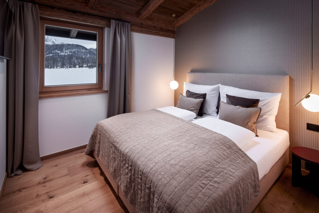 Schlafzimmer Apartmenthaus in St. Ulrich am Pillersee gebaut von Generalunternehmer LW-Immo